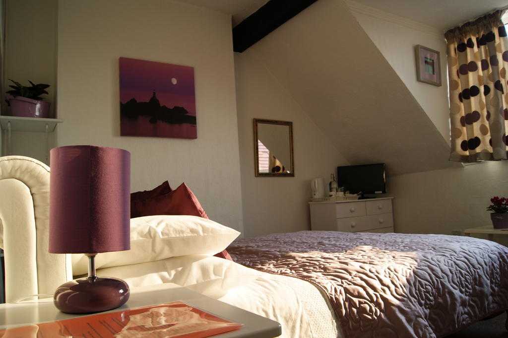 Sunset Guest House Hunstanton Pokoj fotografie A bedroom at the Old Post Office